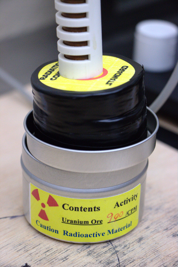 Uranium Ore (Radioactive Check Standard): We verify the sensitivity of our geiger counter by using a known radioactive sample. In this case, a chunk of uranium ore, known to produce 990 counts per minute (CPM).